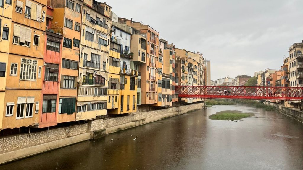 Image of colorful houses lining the river in Girona Spain