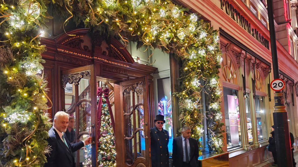 Doorman ouside the side entrance of Fortnum and Mason London 2025