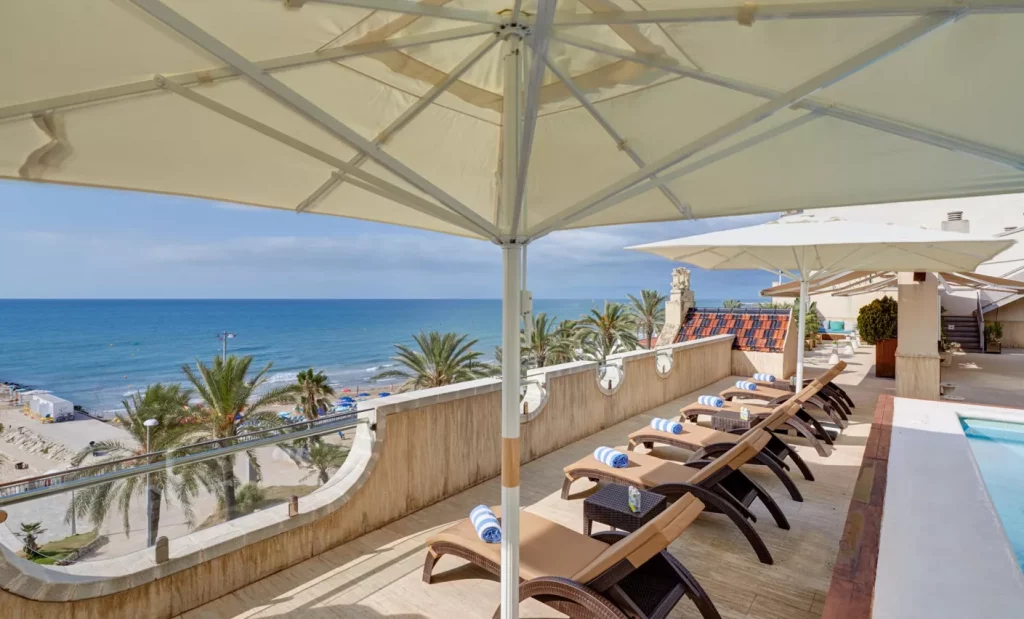 Sercotel Kalma Sitges Rooftop with a view over the promenade and the beach.  One of the best places to go in Europe in February