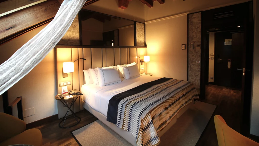 NH Collection Palacio de Tepa bedroom in Madrid city centre