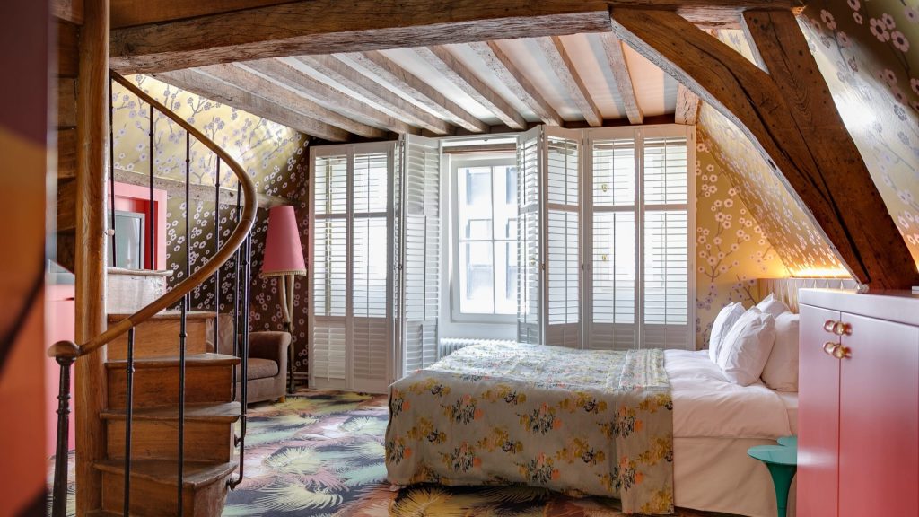 Photo courtesy of Hotel De Witte Lelie Deluxe bedroom in Antwerp perfect for a European trip