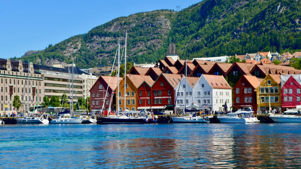 A photograph of the Bryggen wharf in Bergen, norway to illustrate the best places to go in Europe in May