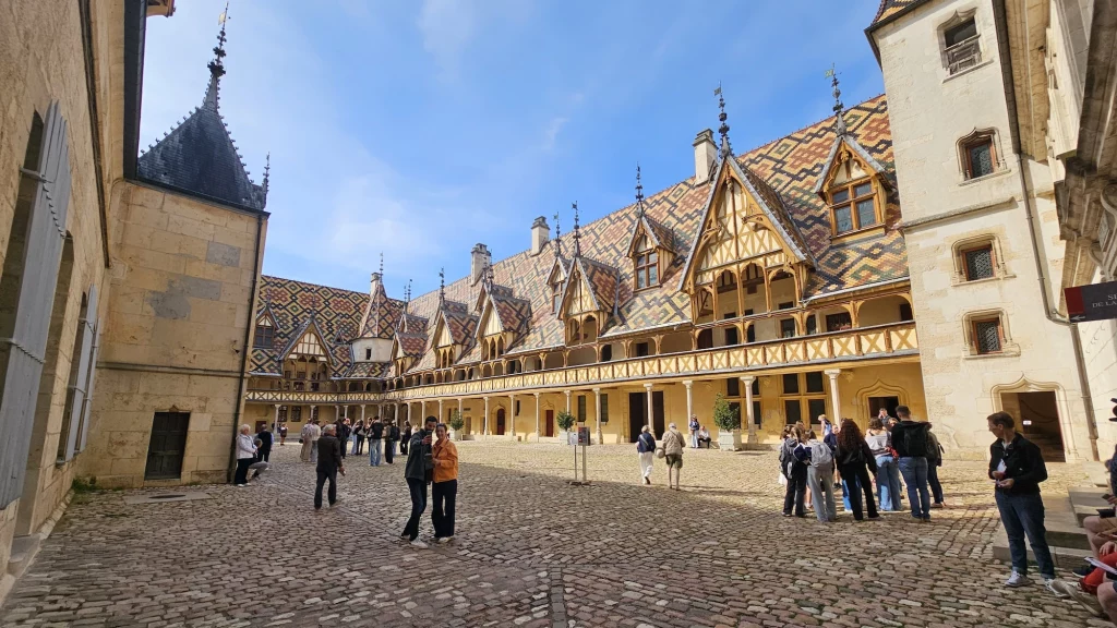 Visit Hospices de Beaune France one of the main draws of the town is the Gothic hotel de dieu an illustration for the question Is Beaune France worth visiting
