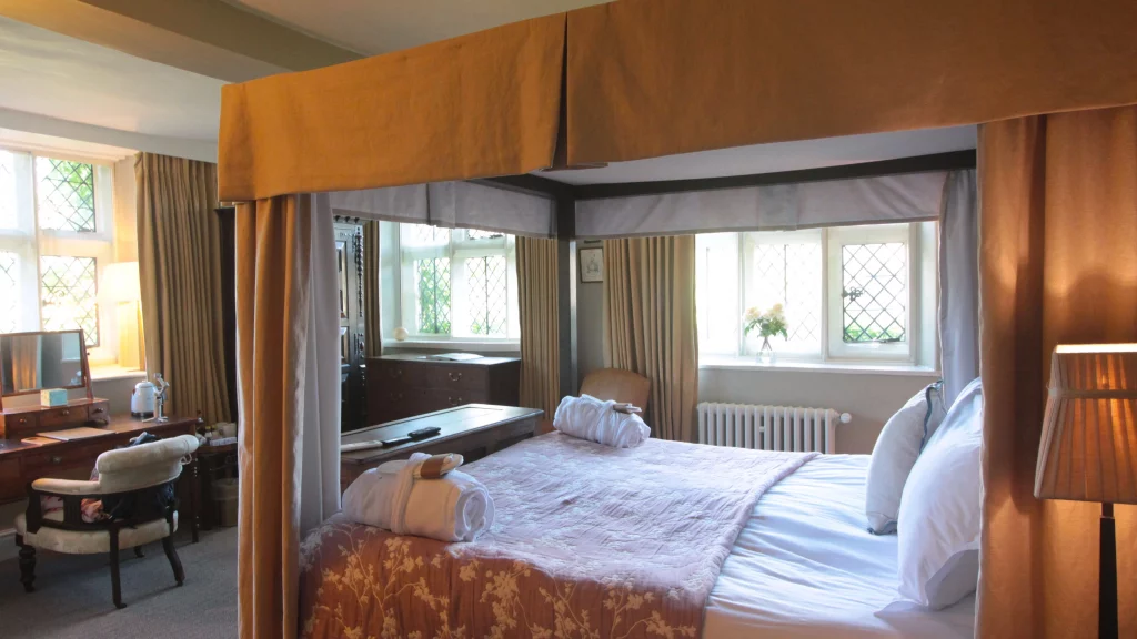 Bedroom 3 with a four poster bed in The Peacock at Rowsley a country house hotel in the Peak District Derbyshire