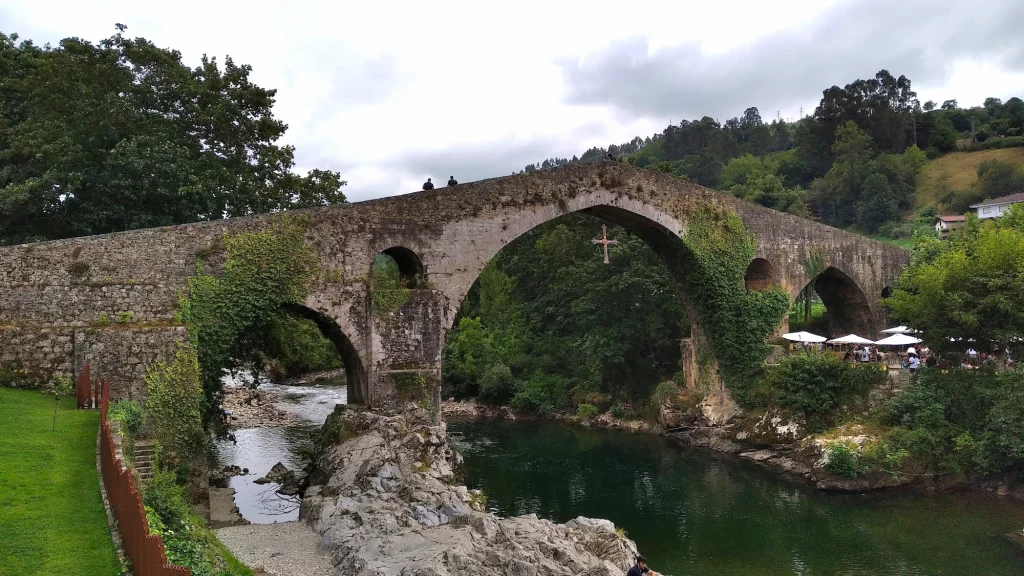 Cangas de Onis - Asturias Spain the medieval bridge over the river Sella. The Asturias is one of the best places to go in Europe in July